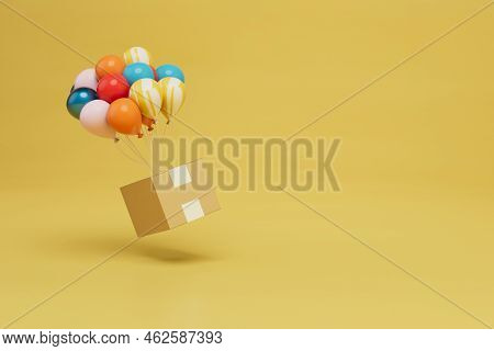 The Concept Of Alternative Parcel Delivery. Parcel Flying On Multi-colored Balloons. Copy Paste, Cop