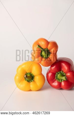 Bulgarian Pepper Of Different Colors On A White Background