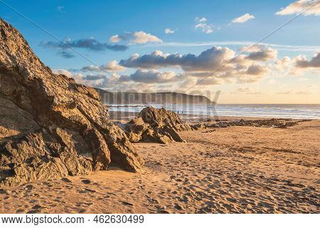 Beautiful Summer Sunset Landscape Image Of Widemouth Bay In Devon England With Golden Hour Light On 