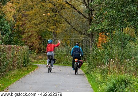 Jette, Brussels Capital Region - Belgium - 11 05 2020 Young Couple Driving The Bike In The Baudouin 