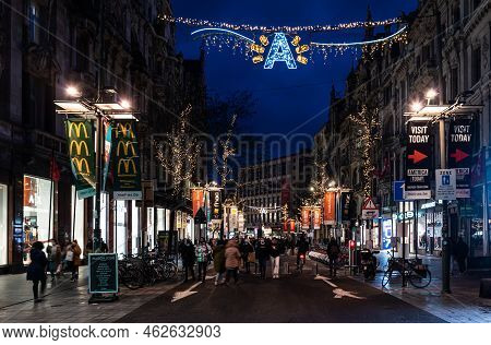 Antwerp, Flanders - Belgium - 12 28 2020  The Central Shopping Street De Meir At Night During Christ