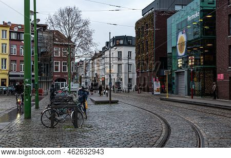 Antwerp, Flanders - Belgium - 12 28 2020 Railway Tracks, Cobble Stone Road And The Library Facade