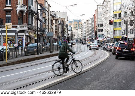 Antwerp, Flanders - Belgium - 12 28 2020 Road With Tramways, Bikes And Cars Around The City Center