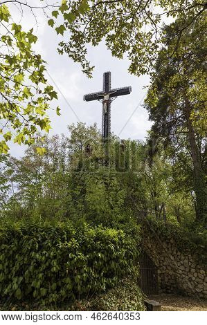 A Cross With Jesus Christ On The Top Of The Chappel Mountain Of Fransiscus From Assisi In Brive In F
