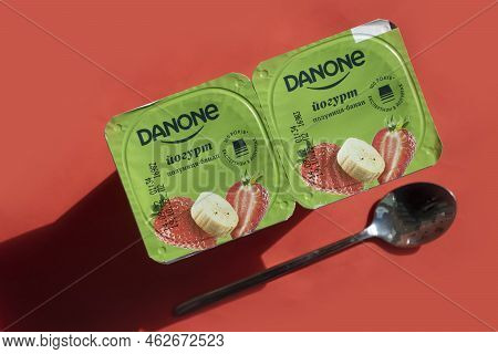 September 25, 2022 Ukraine City Of Kyiv Danone Yogurt On A Colored Background