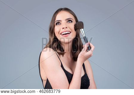 Closeup Portrait Of A Happy Smilin Model With Makeup Blusher Brush And Bright Makeup On A Face. Port