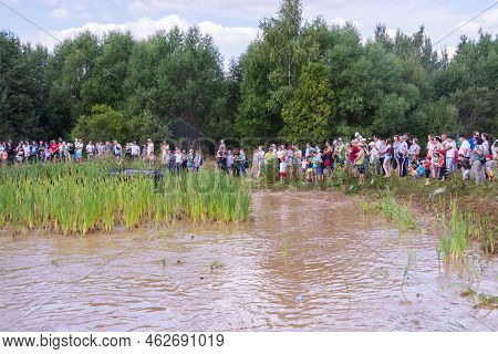 Russia - August 12, 2023, Tver. The Car Overcomes Difficult Obstacles. Large-scale Sports Competitio