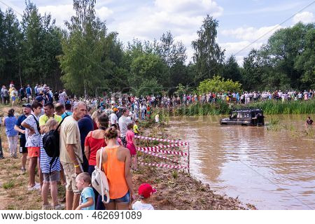 Russia - August 12, 2023, Tver. The Car Overcomes Difficult Obstacles. Large-scale Sports Competitio
