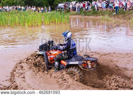 Russia - August 12, 2023, Tver. The Car Overcomes Difficult Obstacles. Large-scale Sports Competitio