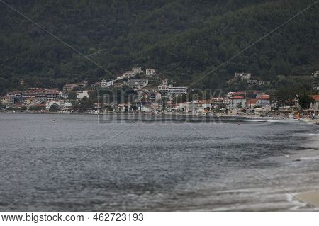 Thassos, Greece - August 25, 2022: Golden Beach (skala Potamia) During A Cloudy Summer Morning After