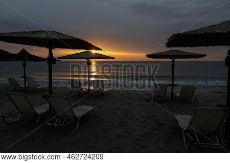Summer Sunrise Over Golden Beach (skala Potamias) In Greece With An Overcast Sky.