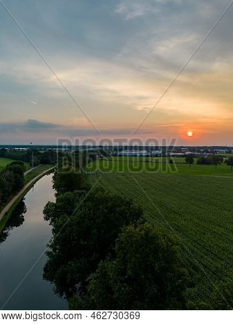 Colorful And Dramatic Sunset Over The Canal Dessel Schoten Aerial Photo Shot By A Drone In Rijkevors