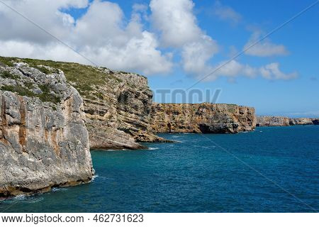 Scenic Rocks On Atlantic Coast Near Cabo De Sao Vicente Cape In The Algarve, Portugal, On Bright Sum