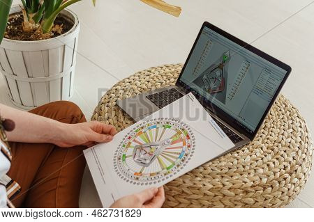 Tver, Russia-august 7, 2022. A Woman With A Laptop Is Studying Human Design. The Concept Of Studying