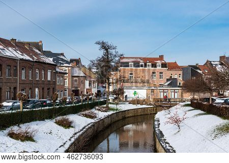 Jodoigne, Wallonia - Belgium - 01 23  2021- Scenic View Over The Gete River Reflecting Old Town Buil