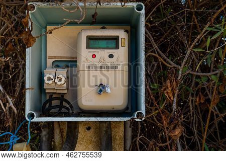 Cala Llombards, Spain; September 23 2022: Close-up Of An Electric Meter Box Outside, With A Backgrou