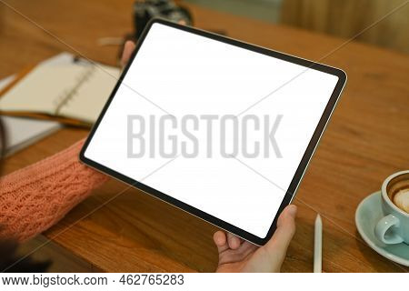 Close Up View Female Hands Holding Digital Tablet With Lank Screen.