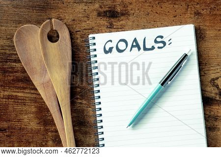 Food Goals. Plan For Eating Or Cooking Concept, Overhead Flat Lay Shot Of A Notepad Ready For Writin