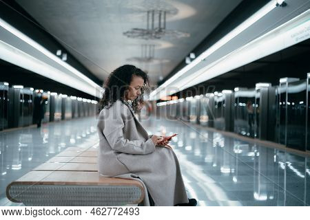 Young Woman Reading An Email On Her Smartphone.