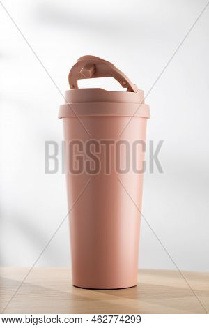Pastel Pink Stainless Steel Tumbler Size 20 Ounce On Wooden Table