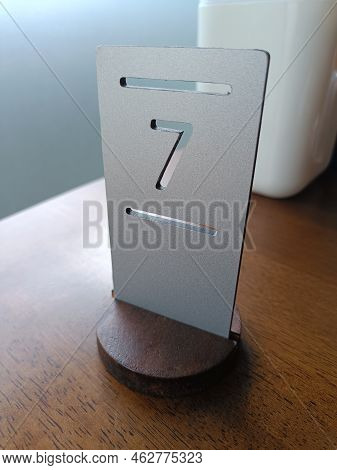 Table Number Seven Made Of Iron In A Restaurant