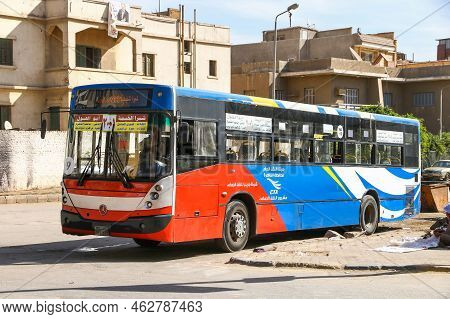 Giza, Egypt - January 26, 2021: Red Urban Bus Mcv C120 In The City Street.
