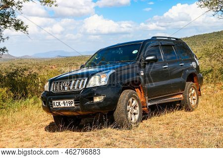 Taita Hills, Kenya - February 3, 2021: Black Offroad Car Toyota Land Cruiser Prado 120 In The Tsavo 