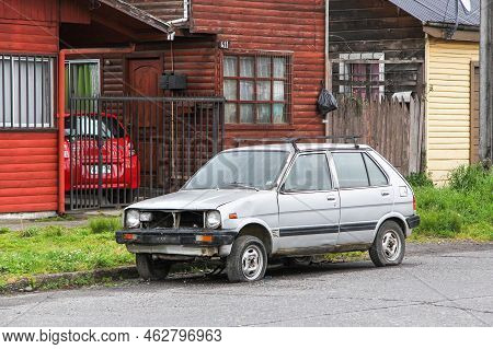 Villarrica, Chile - November 20, 2015: Abandoned Minicar Subaru Rex In A City Street.