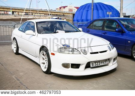 Novyy Urengoy, Russia - June 11, 2022: White Sports Coupe Toyota Soarer (z30) In A City Street.