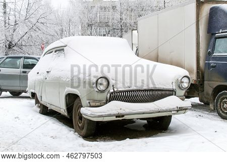 Nizhniy Novgorod, Russia - January 6, 2009: Snow Covered Classic Car Gaz-21 Volga In A City Street.