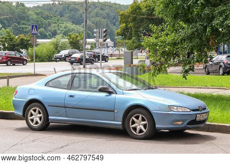 Moscow, Russia - July 7, 2012: Cyan Sportscar Peugeot 406 Coupe In The City Street.