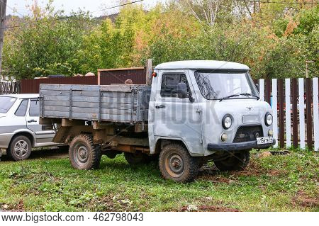 Asha, Russia - September 17, 2021: Classic Soviet Offroad Minitruck Uaz-3303 In The City Street.