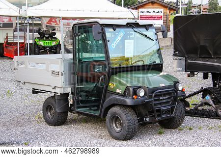 Valais, Switzerland - August 5, 2014:brand New Minitruck Kawasaki Mule 3010 In The Village Street.