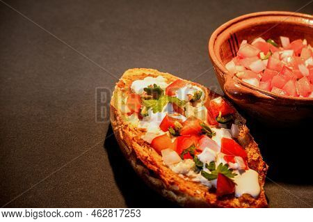 Mexican Molletes, Traditional Food With Bread, Beans, Cheese, Tomato And Chili