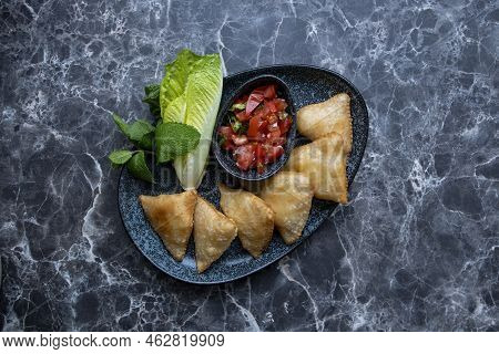 Top View Of Samosa Fried And Salad