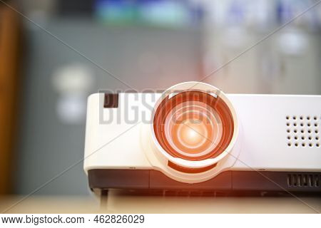 Close-up Computer Projector On Table Boardroom Or Meeting Room Technology Equipment Of Visual Or Vis