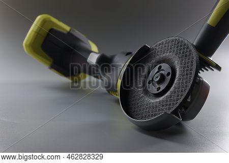 Cordless Hand Sander On A Gray Background, Close-up. Electric Power Tools. Diy Repair, Construction 