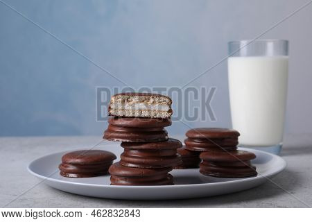 Tasty Choco Pies And Milk On Grey Table