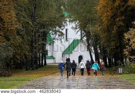 Tula, Russia - September 24, 2022: Child Running Down The Alley In The Park. Children Run In The Par