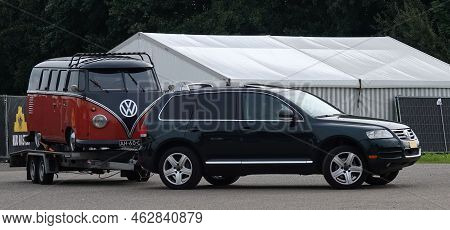 Biddinghuizen, Netherlands - Sept 23 2022 A Beloved Old-timer, A Red Black Volkswagen Type 2 First G