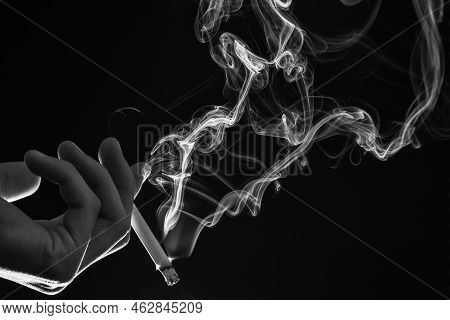 Tobacco Is Wacko. Steaming Cigarette In Male Hand. Smoking Habit. Tobacco Smoke
