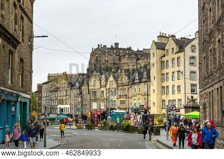 Edinburgh, Scotland 2022, August 21: Edinburgh Street Views, Old Town. People Walking On The Road
