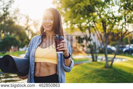 Calm Sporty Woman In Sportswear Having A Cup Of Coffee After Exercising In The Morning In The City P