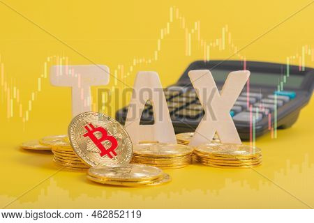 Tax Btc Cryptocurrency With Tax Wording On Bitcoin And Caculator On Stock Graph Yellow Background