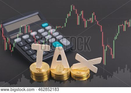 Tax Btc Cryptocurrency With Tax Wording On Bitcoin And Caculator On Stock Graph Yellow Background