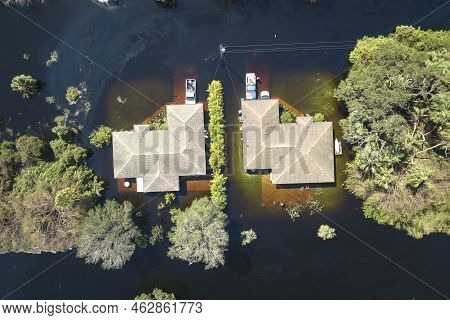 Hurricane Ian Flooded Houses In Florida Residential Area. Natural Disaster And Its Consequences