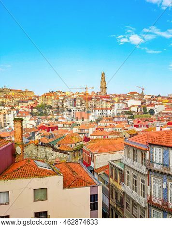 Porto Cityscape With Clérigos Tower In Background, Red Rooftops Of Old Town, Portugal