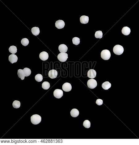 Tapioca Pearls On Black Background. Tapioca Pearls Are Produced By Passing The Moist Starch Extracte