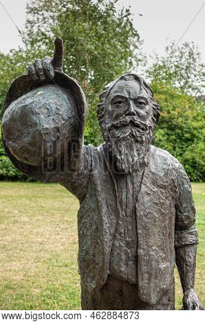 Germany, Lubeck - July 13, 2022: Facial Closeup Of Johannes Brahms Black-green Bronze Statue Set In 
