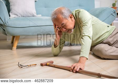 Sick Senior Old Man Falling Down Lying On The Ground Because Stumbled At Home Alone With Wooden Walk